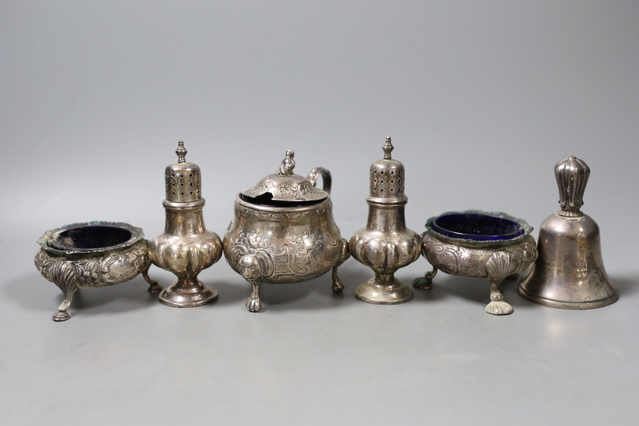 A modern silver hand bell and five assorted silver condiments including three 19th century.